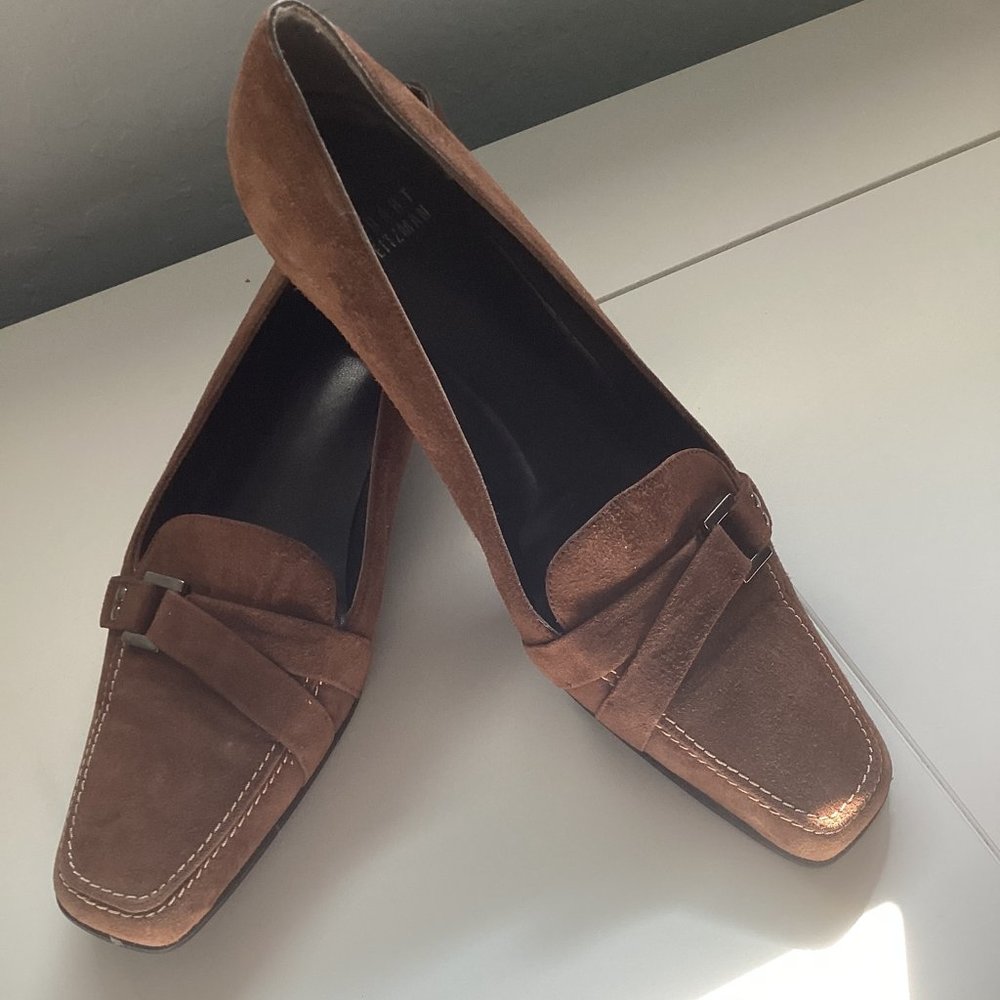 Stuart Weitzman women’s brown shoes.
